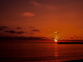 Scenic view of sea at sunset