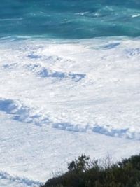 Close-up of snow on sea