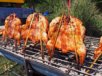 Close-up of meat on barbecue grill