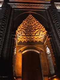 Low angle view of illuminated historic building