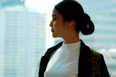 Portrait of woman looking away