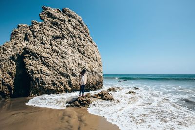 Scenic view of sea against clear sky