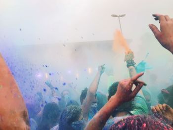 Group of people enjoying at holi