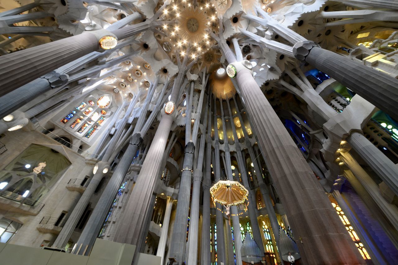 LOW ANGLE VIEW OF ILLUMINATED CEILING OF BUILDING