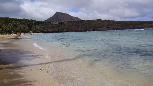Scenic view of beach against sky