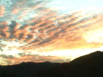 Scenic view of landscape against sky during sunset