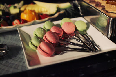 Close-up of macaroons served in plate on table