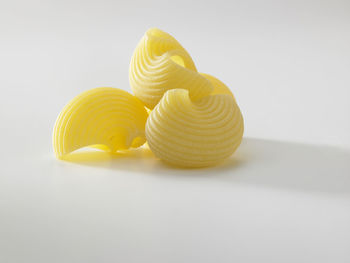 Close-up of pasta on white background