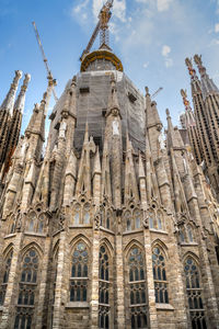 Low angle view of sagrada familia against sky