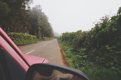 Road seen through car windshield