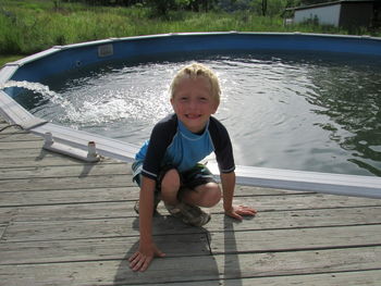 Portrait of smiling boy in water