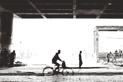 Silhouette of woman in city