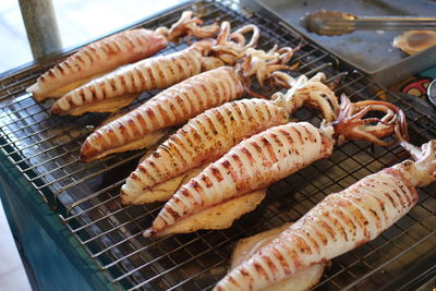 Close-up of meat on barbecue grill