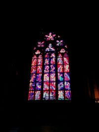 Low angle view of illuminated lights at night