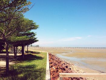 Scenic view of beach against clear sky