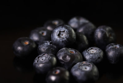 Close-up of blueberries on black background