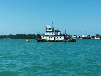 Boats in calm blue sea