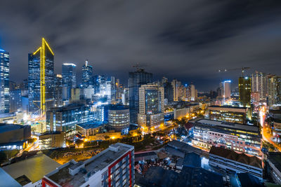 High angle view of illuminated buildings in city against sky