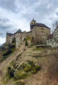 Old ruins against cloudy sky