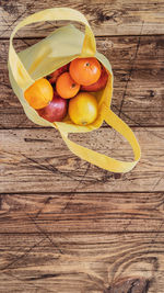 High angle view of fruits in bowl on table