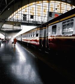 Blurred motion of train at railroad station