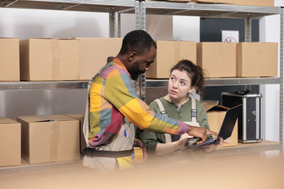 Side view of man working in gym