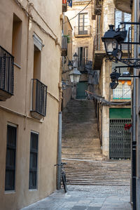 Narrow alley amidst buildings in city