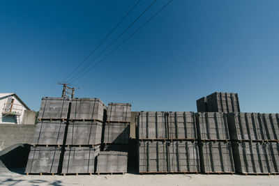 Low angle view of building against clear blue sky
