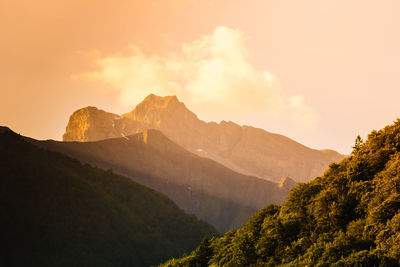 Scenic view of mountains against sky during sunset