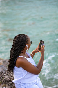 Young woman using mobile phone