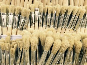 Full frame of paint brushes