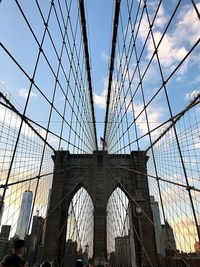 Low angle view of brooklyn bridge against sky