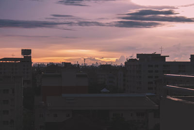 High angle view of buildings against sky during sunset