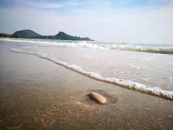 Scenic view of beach against sky