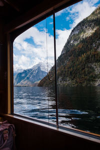 Scenic view of lake seen through window