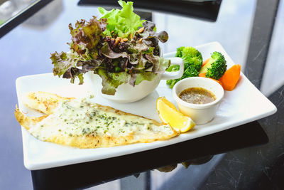 High angle view of serving food in plate