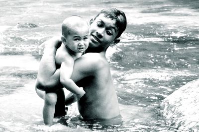 Father and son at shore