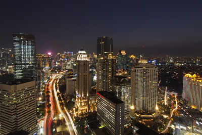 Illuminated cityscape at night