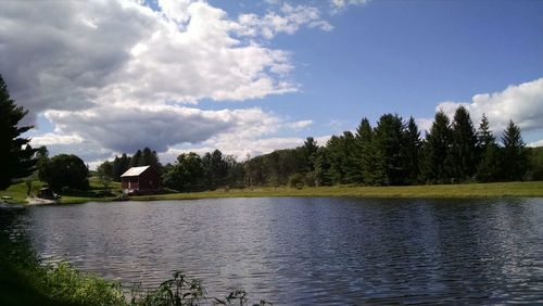 View of lake against cloudy sky