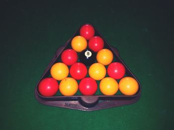 High angle view of multi colored pool balls on table