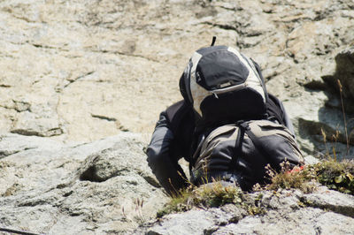 Man sitting on rock