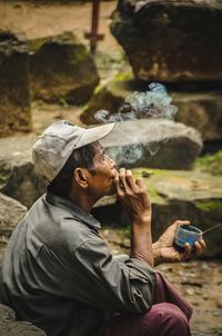 Woman sitting outdoors