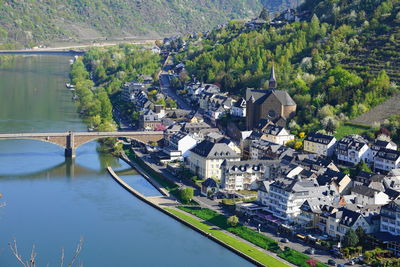 High angle view of townscape by river