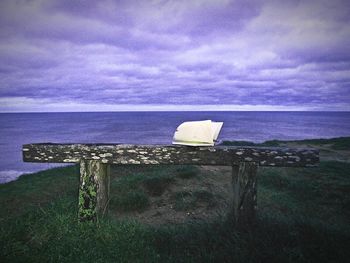 Scenic view of sea against cloudy sky