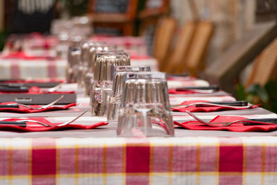 Close-up of glasses on dining table