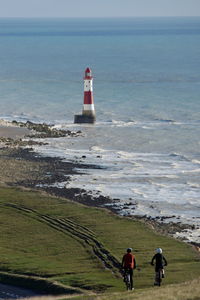 Rear view of lighthouse on beach