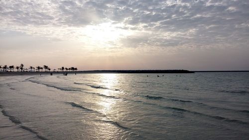 Scenic view of sea against sky at sunset