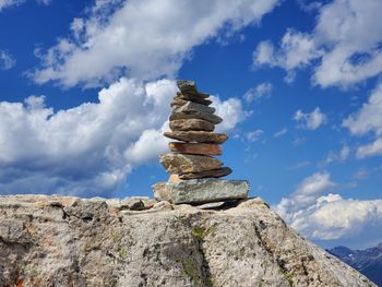 Low angle view of rocks against sky