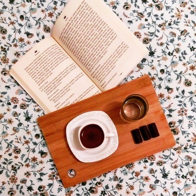 table, coffee cup, indoors, coffee - drink, high angle view, still life, wood - material, food and drink, drink, refreshment, directly above, coffee, wooden, cup, saucer, freshness, spoon, close-up, wood, no people