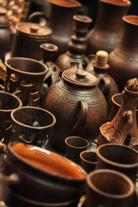 Various wooden kitchen utensils for sale at market stall